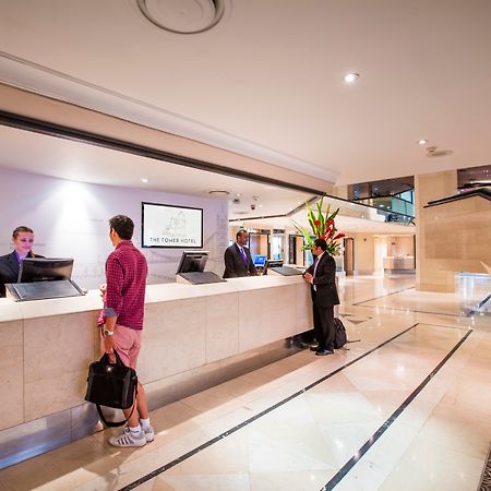 The Tower Hotel, By Thistle Londra Esterno foto Reception desk at The Tower Hotel