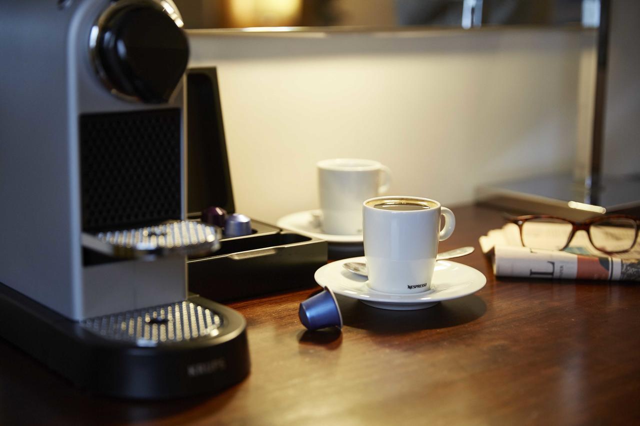 The Tower Hotel, By Thistle Londra Esterno foto A Nespresso coffee machine