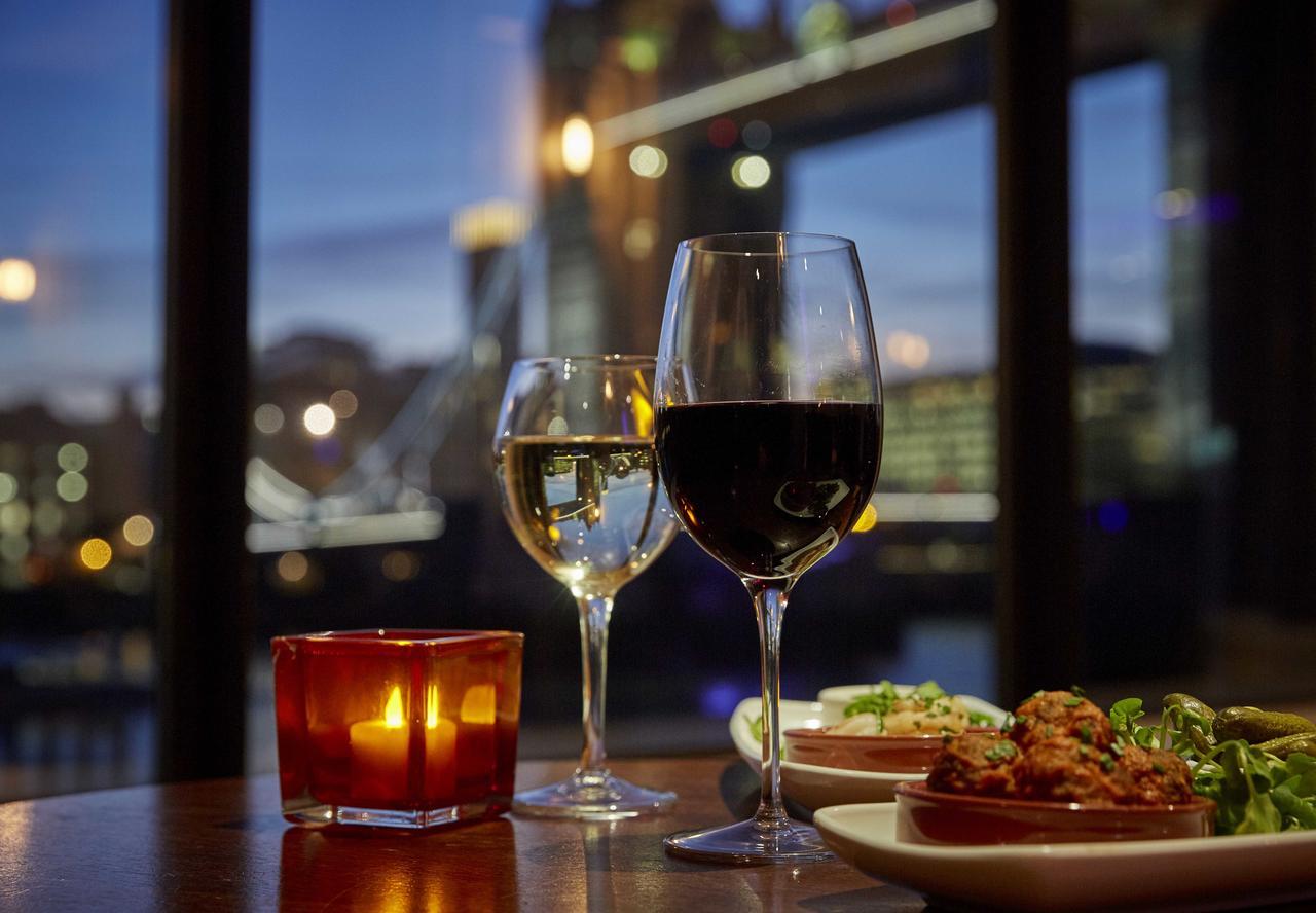 The Tower Hotel, By Thistle Londra Esterno foto Wine and tapas at a restaurant in Barcelona